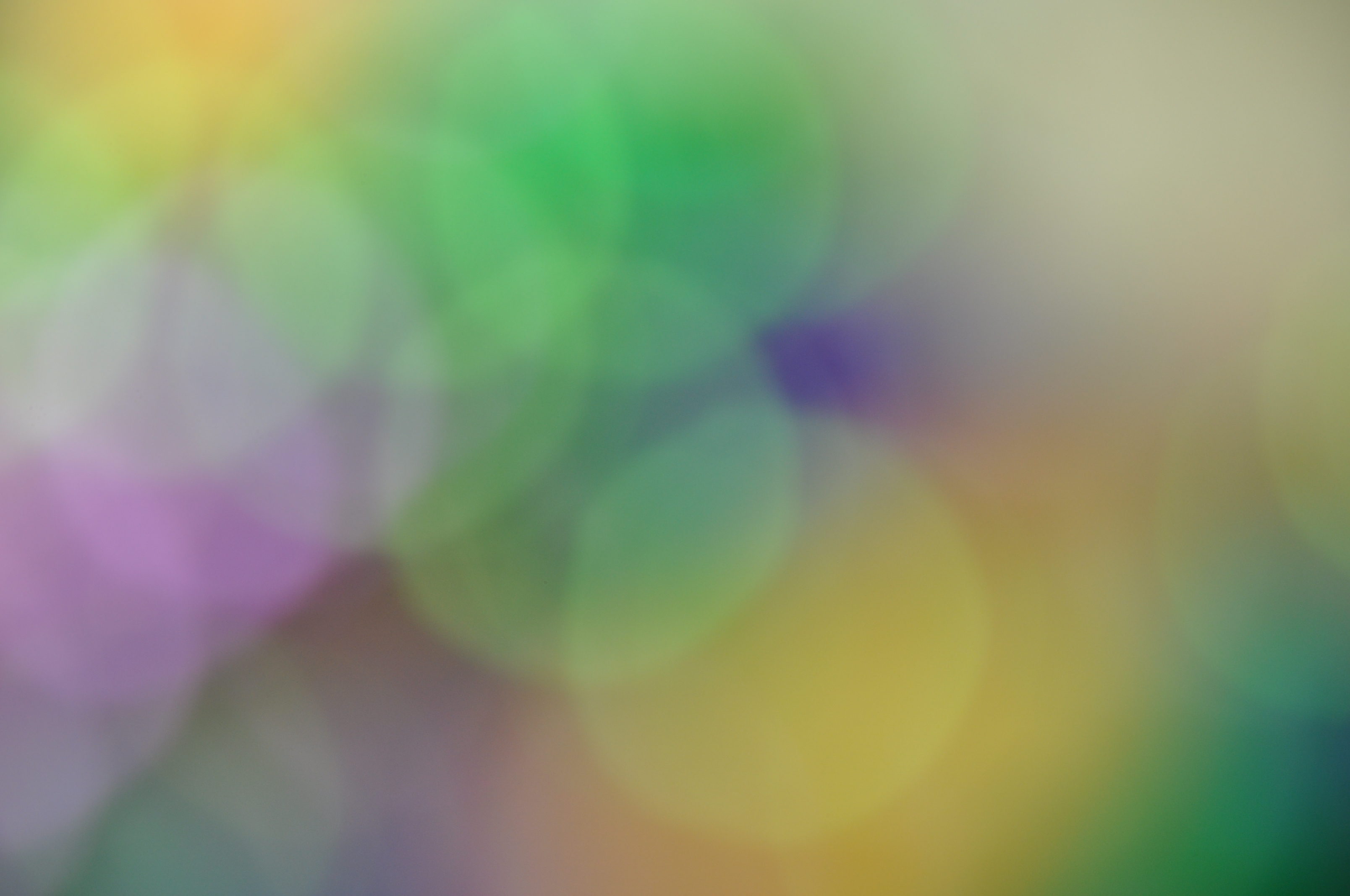 mardi gras colored blurred background img